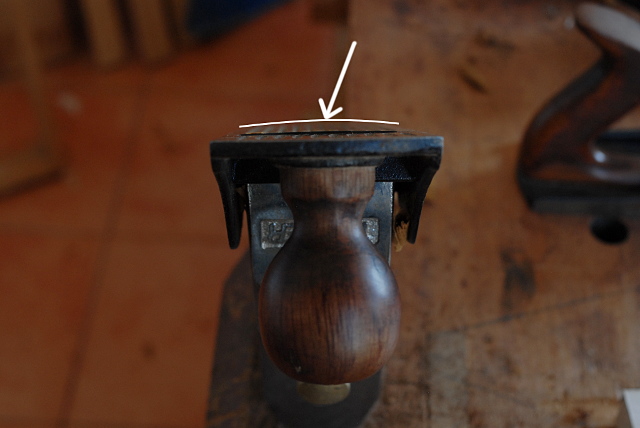 Cambered iron